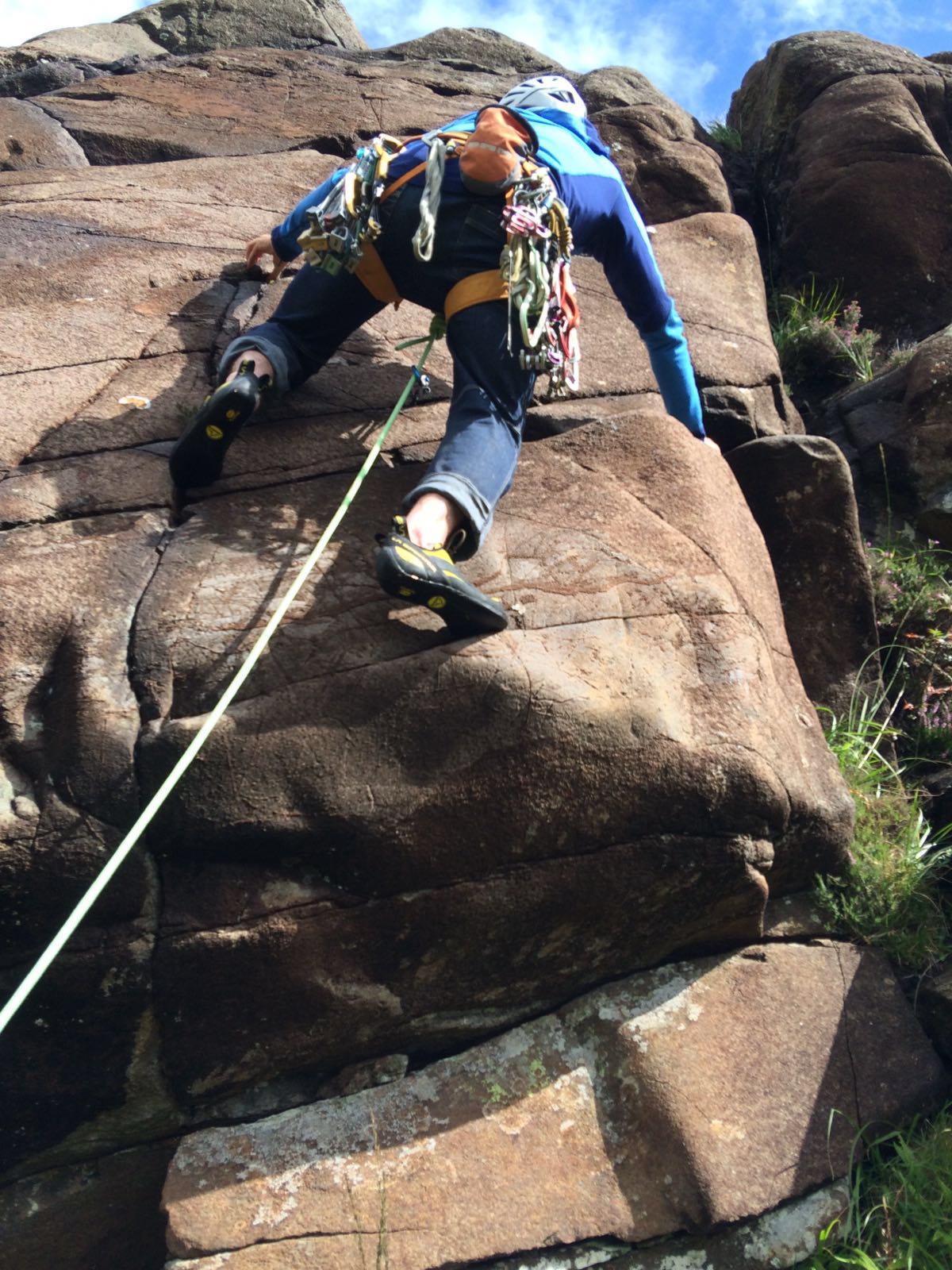 A climber enjoying climbing a rockface